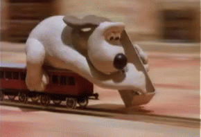 Gromit laying track gif
